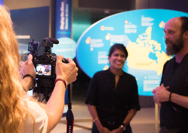 Asha de Vos and Dave Ireland are interviewed at the Out of the Depths: The Blue Whale Story Exhibit in May, 2017. Photo Credit: Meghan Callon