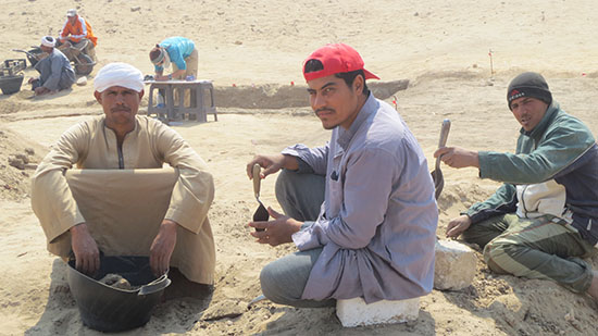 Workers from Dr. Kemps team pose with archaelogical tools.  © Laura Ranieri