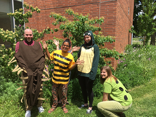 a group from the Biodiversity Institute of Ontario in Guelph pose with some costumes outside their building. Photo courtesy of Angela Telfer