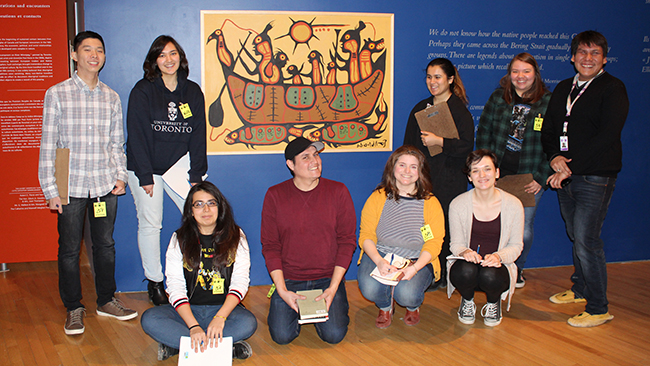 Youth Cabinet members explore the Daphne Cockwell Gallery of Canada: First Peoples with Tyler Pennock.